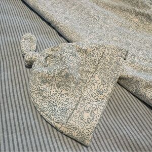 Organic Newborn Matching Hat and Swaddle with Blue and White Animal Pattern